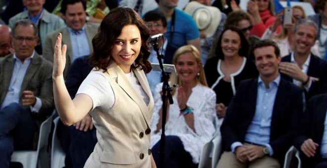 21/05/2019.- La candidata del PP a la Comunidad de Madrid, Isabel Díaz Ayuso, interviene en un acto electoral junto al presidente PP, Pablo Casado, esta tarde en Collado Villalba. EFE/ Paolo Aguilar