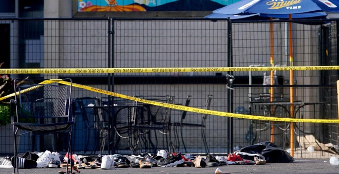 Escenas posteriores al tiroteo que acabó con la vida de nueve personas en Dayton, Ohio. / Reuters