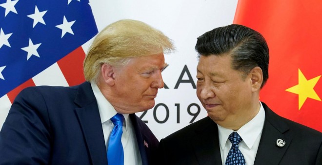 El presidente estadounidense, Donald Trump, junto a su homólogo chino, Xi Jinping, en la cumbre del G20. / Reuters