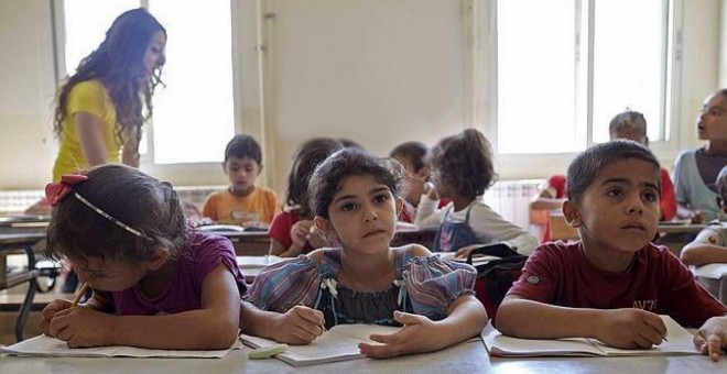 14/05/2016 - Niños sirios en una escuela de la ONU. / EFE