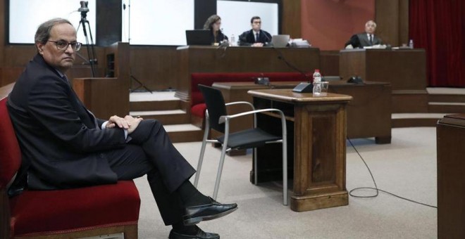 El president de la Generalitat, Quim Torra, antes del inicio del juicio en su contra en el Tribunal Superior de Justicia de Catalunya. /EFE