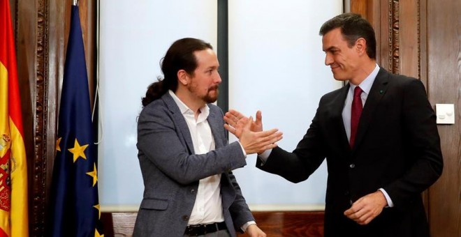 Pedro Sánchez y Pablo Iglesias en la presentación del documento para el Gobierno de Coalición. | EFE