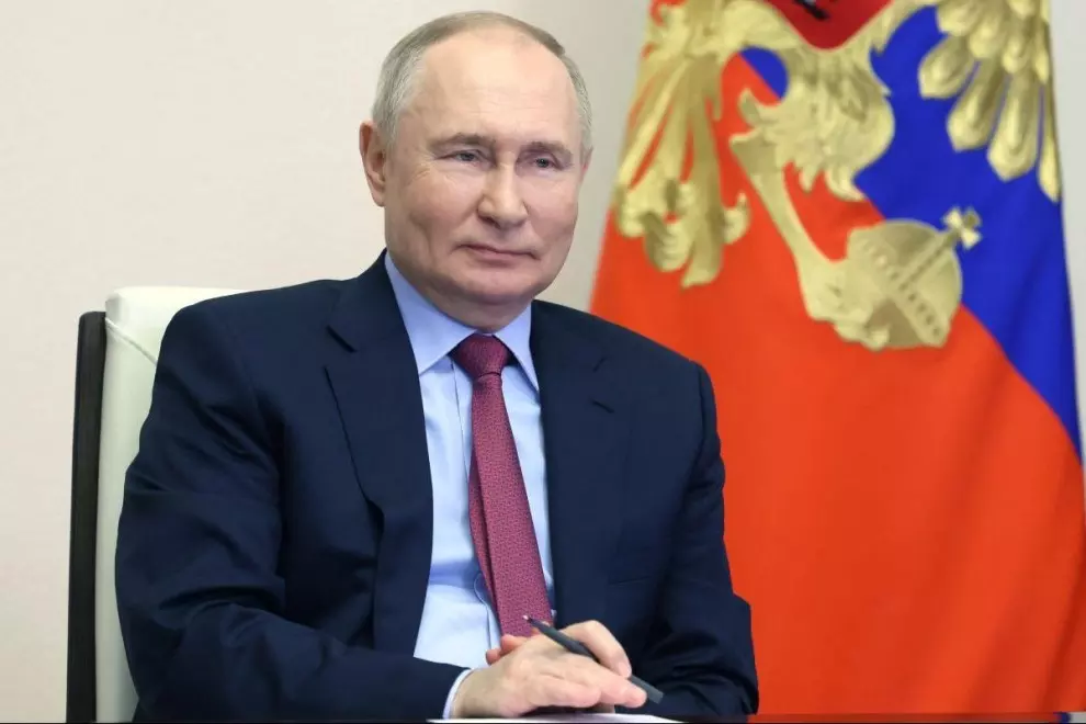 El presidente ruso Vladimir Putin asiste a una ceremonia por videoconferencia en las afueras de Moscú, a 14 de marzo de 2024. — Mikhail Metzel / AFP