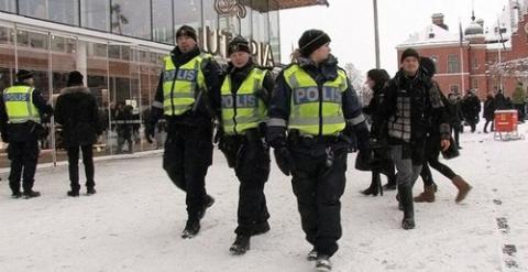 Agentes suecos de policía. F. BARBER