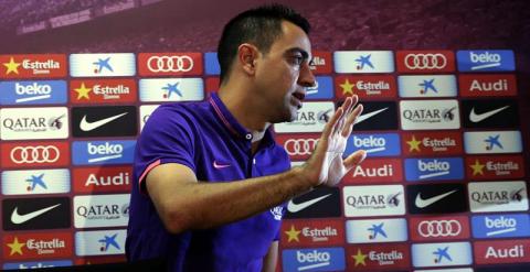 Xavi Hernández en la rueda de prensa de su despedida. /EFE