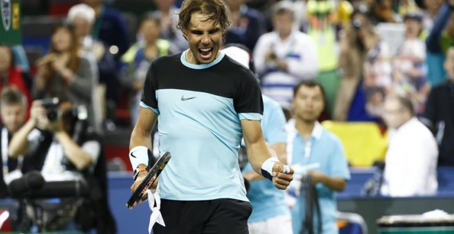 Rafa Nadal celebra su victoria contra el canadiense Raonic. /EFE