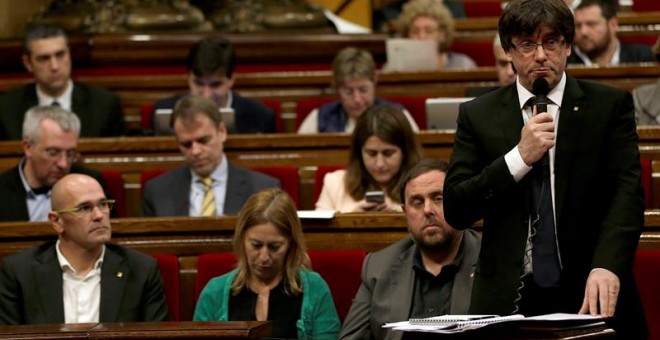 El presidente de la Generalitat, Carles Puigdemont, junto a su vicepresidente, Oriol Junqueras, la consellera de Presidencia, Neus Munté, y el conseller de Asuntos Exteriores, Raül Romeva. EFE