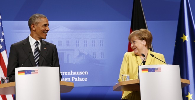 El presidente de EEUU, Barack Obama, y la canciller alemana, Angela Merkel, durante la rueda de prensa conjunta en Hannover. REUTERS/Kevin Lamarque