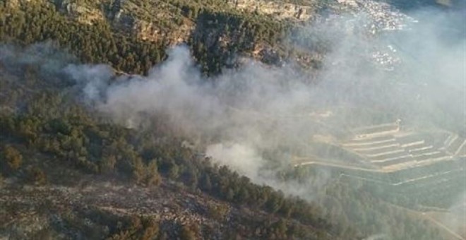El incendio de Bolbaite quema 1.535 hectáreas y el de Carcaixent 1.224