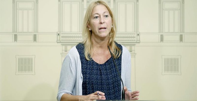 La consellera de la Presidencia, Neus Munté, durante la rueda de prensa que ha ofrecido esta tarde en el Palau de la Generalitat. EFE/Andreu Dalmau