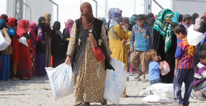 Familias iraquíes obligados a abandonar sus casas en el campamento de desplazados de Daquq. - REUTERS