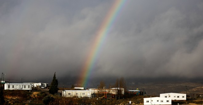 Un arco iris se levanta sobre el asentamiento israelí de Amona en la Cisjordania ocupada/REUTERS