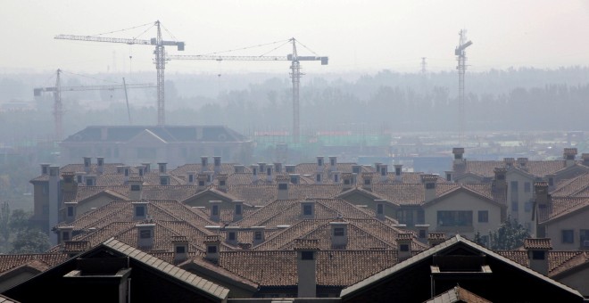 Un bloque de viviendas en construcción en el barrio de Wuqing, en la ciudad china de Tianjin. REUTERS/Jason Lee