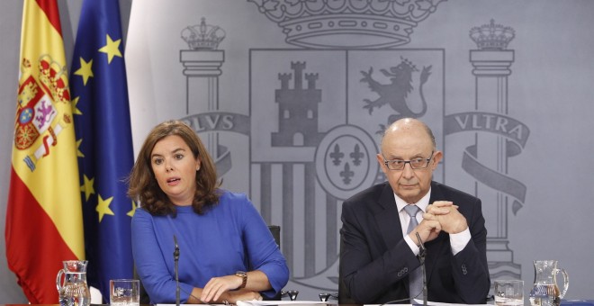 Soraya Santamaría y Cristóbal Montoro /EUROPA PRESS
