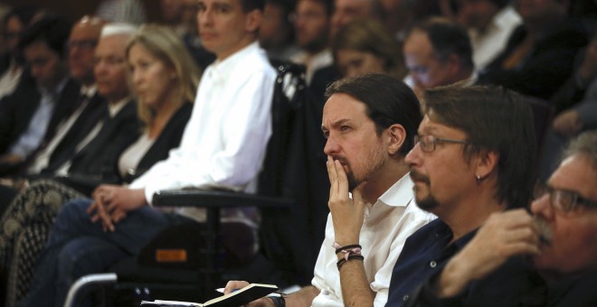 El líder de Podemos, Pablo Iglesias asiste a la conferencia  pronunciada por el presidente de la Generalitat, Carles Puigdemont en el Auditorio Caja de Música CentroCentro, en el Palacio de Cibeles. EFE/ Fernando Alvarado