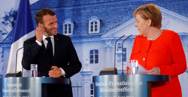 La canciller alemana, Angela Merkel, y el presidente francés, Emmanuel Macron. / REUTERS