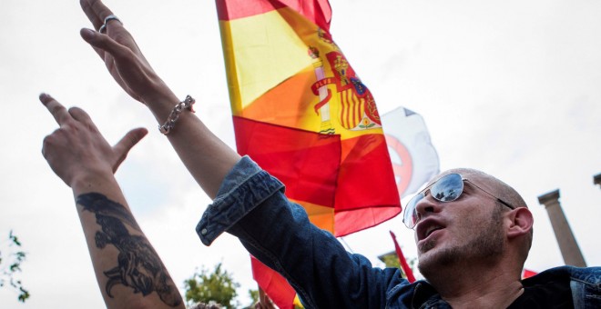 Participants en la manifestació espanyolista d'aquest diumenge, 9 de setembre, a Barcelona. EFE / Enric Fontcuberta.