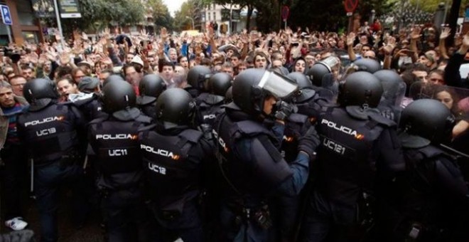 Intervención policial del 1 de octubre en Catalunya. / EFE