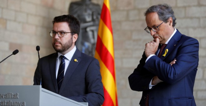 El vicepresident i el president de la Generalitat, Pere Aragonès i Quim Torra, en compareixença conjunta aquest divendres. EFE / Toni Albir.