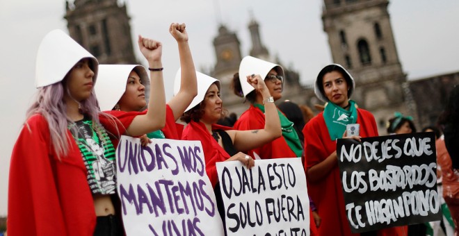 Women participate in a march during International Women's Day in Mexico City