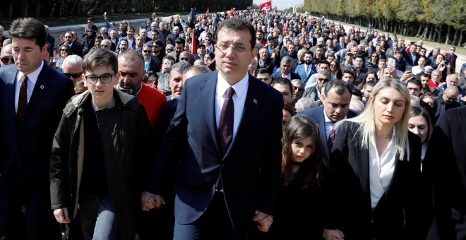 Ekrem Imamoglu, main opposition Republican People's Party (CHP) candidate for mayor of Istanbul, visits Anitkabir, the mausoleum of modern Turkey's founder Mustafa Kemal Ataturk, as he is flanked by his family members and supporters in Ankara, Turkey, Apr