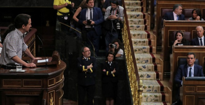 El líder de Unidas Podemos, Pablo Iglesias, en la tribuna del Congreso de los Diputados durante el debate de investidura de Pedro Sánchez, el pasado julio. REUTERS/Sergio Perez