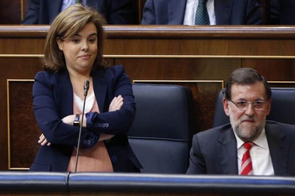 La vicepresidenta Soraya Sáenz de Santamaría junto al presidente del Gobierno Mariano Rajoy. EFE