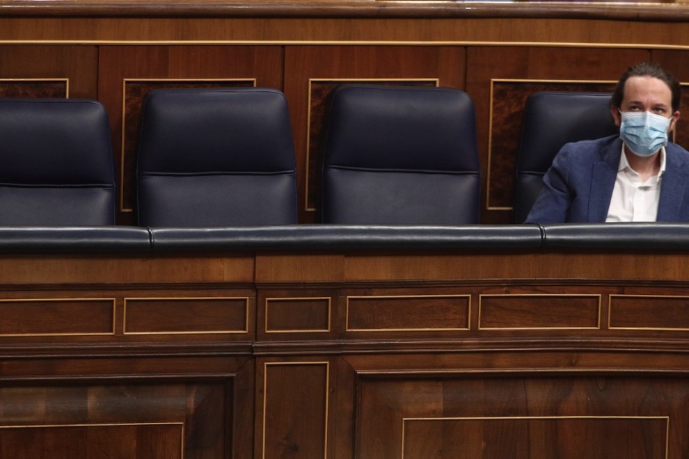 El vicepresidente segundo del Gobierno, Pablo Iglesias, en su escaño, durante una sesión de control al Gobierno en el Congreso. E.P./E. Parra/Pool