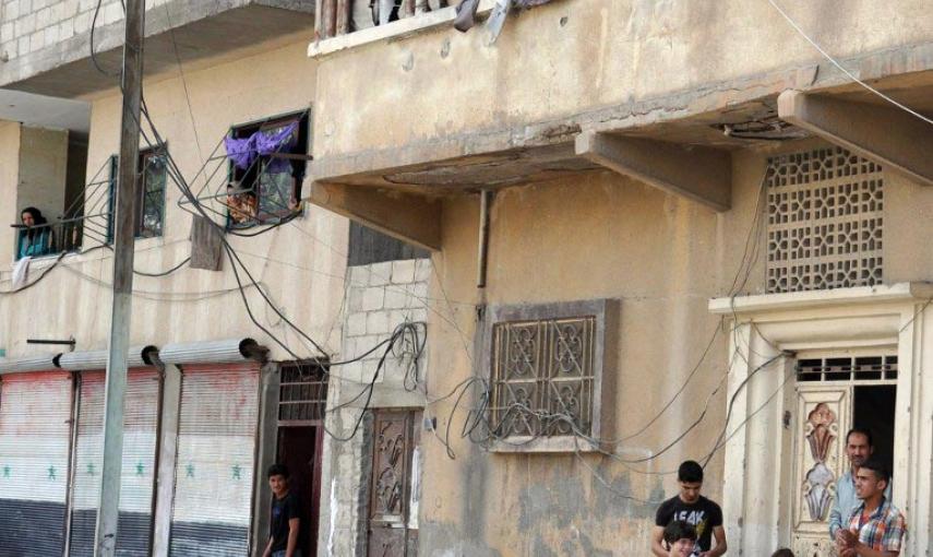 Habitantes de la ciudad de Palmira el 18 de mayo, un día después de los bombardeos del Estado Islámico que mataron a 15 personas. AFP