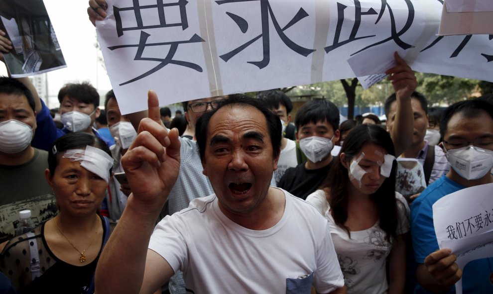 Los manifestantes pedían al Gobierno chino mayores ayudas y compensaciones económicas. REUTERS