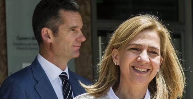 La infanta Cristina y su marido, Iñaki Urdangarin, a la salida de la sede de la Escuela Balear de la Administración Pública (EBAP) de Palma tras asistir a la presentación de las conclusiones del juicio del caso Nóos. EFE/Cati Cladera