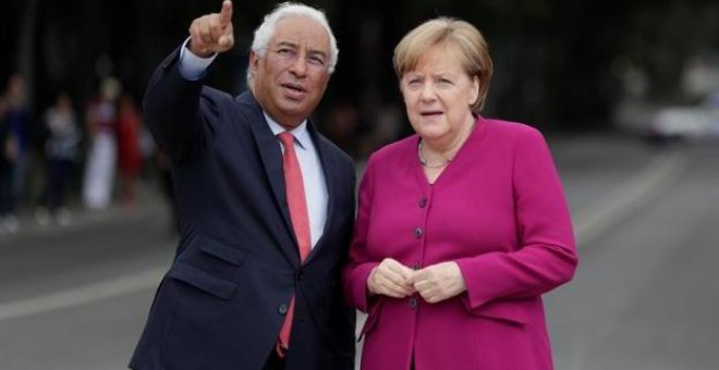 Antonio Costa y Angela Merkel - REUTERS