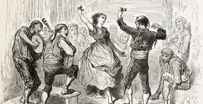 Un hombre y una mujer bailan una jota aragonesa tradicional.