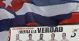 Un cartel muestra a Los Cinco espías cubanos durante una protesta en La Habana. /REUTERS/Enrique De La Osa