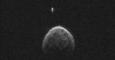 Captura de la NASA en el que el asteroide pasa cerca del planeta Tierra