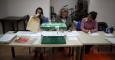 Los miembros de una mesa electoral en un colegio de Ronda se preparan para l jornada de votación. REUTERS/Jon Nazca