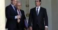 Francois Hollande, Manuel Valls y Bernard  Cazeneuve conversan en el Palacio del Eliseo. /REUTERS