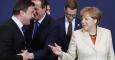 Bettel, Cameron y Merkel, en la cumbre extraordinaria sobre inmigración. / EFE