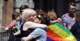 A couple kiss after early results suggest an overwhelming majority in favour of the referendum on same-sex marriage, in Dublin, Ireland, 23 May 2015. With counting still taking place in the historic referendum, early results are suggesting the Yes side ha