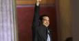 Alexis Tsipras alza el puño en un acto de Syriza. EFE