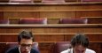 Iñigo Errejón y Pablo Iglesias, en sus escaños en el Congreso de los Diputados. REUTERS