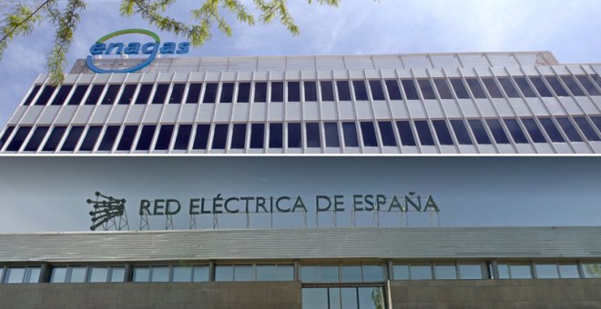 Los logos de Enagas y de REE en sus respectivas sedes en Madrid.