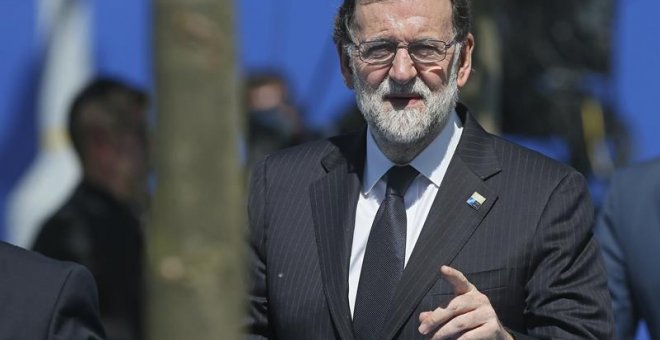 El presidente del Gobierno español, Mariano Rajoy, a su llegada a la sede de la OTAN para asistir a la reunión de líderes de la Alianza que se celebra este jueves en Bruselas (Bélgica). EFE/Stephanie Lecocq