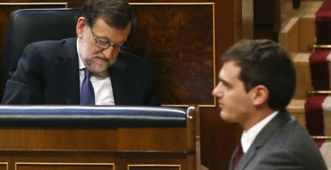 El presidente del Gobierno, Mariano Rajoy, y el líder de Ciudadanos, Albert Rivera, en el Congreso. Archivo REUTERS