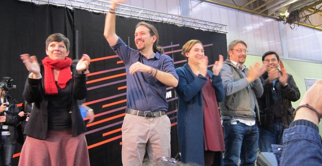 Pablo Iglesias, Ada Colau y Xavi Domènech en un acto de Podem. Archivo/EUROPA PRESS