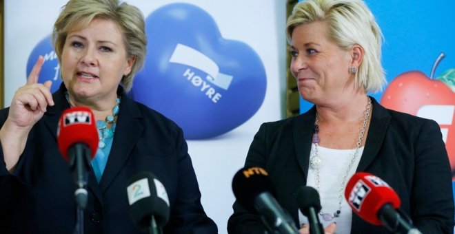 La primera ministra noruega, la conservadora Erna Solberg (izq.), junto a su socia de Gobierno, Siv Jensen, del populista de ultraderecha Partido del Progreso.- REUTERS
