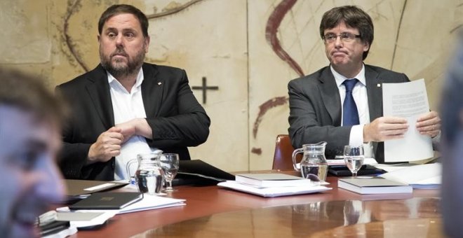 Oriol Junqueras i Carles Puigdemont a la reunió del govern de la Generalitat
