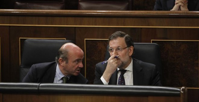 Mariano Rajoy y Luis De Guindos en el Congreso de los Diputados. EUROPA PRESS
