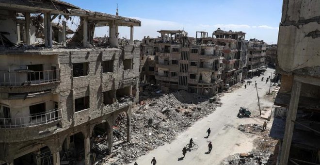 Vista general de los edificios destruidos en un barrio de Duma, en Guta Oriental, el principal feudo opositor cerca de Damasco (Siria). EFE