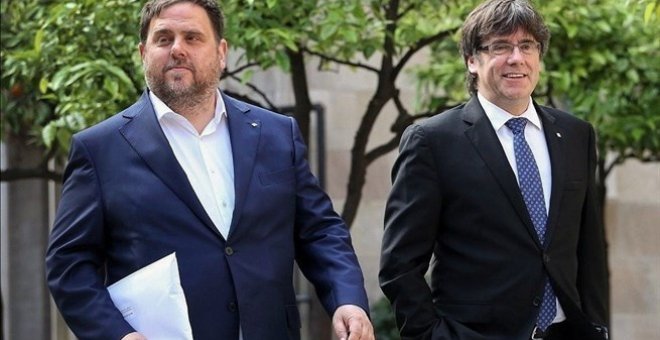 Carles Puigdemont y Oriol Junqueras.